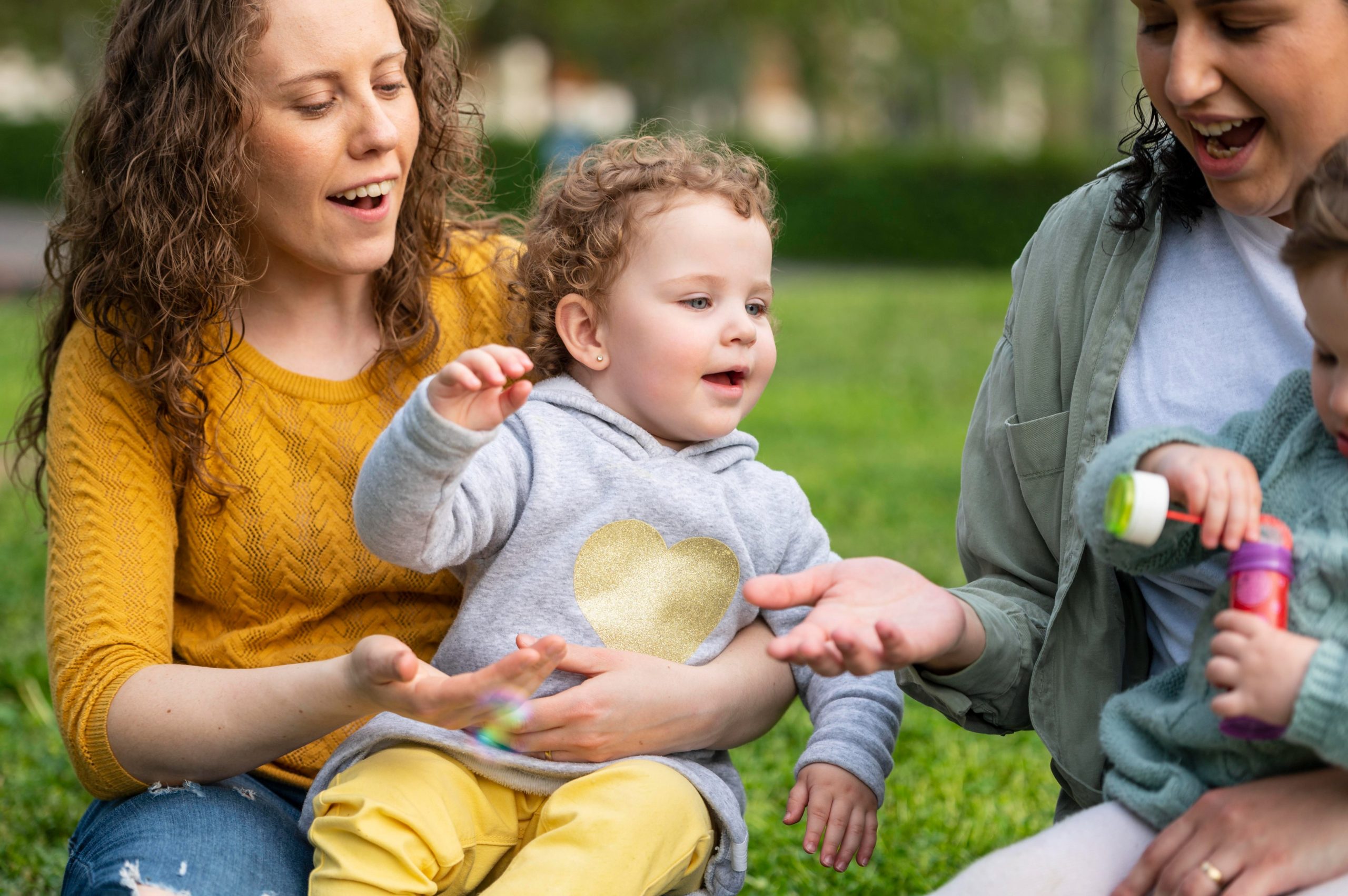 lgbt mothers outdoors park with their children (1)