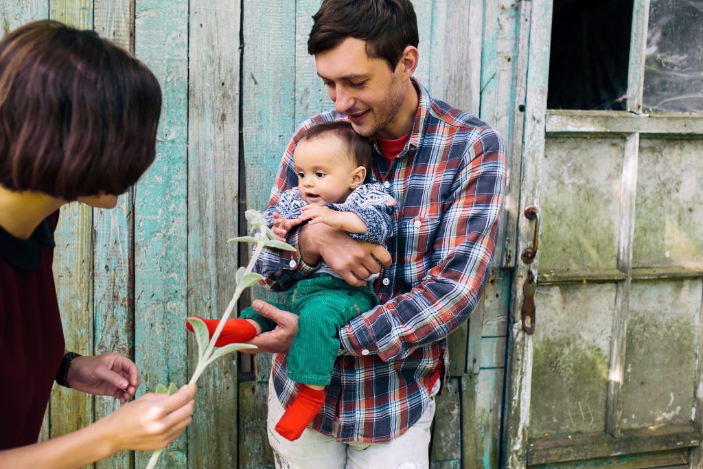 man with baby wife outside (1)